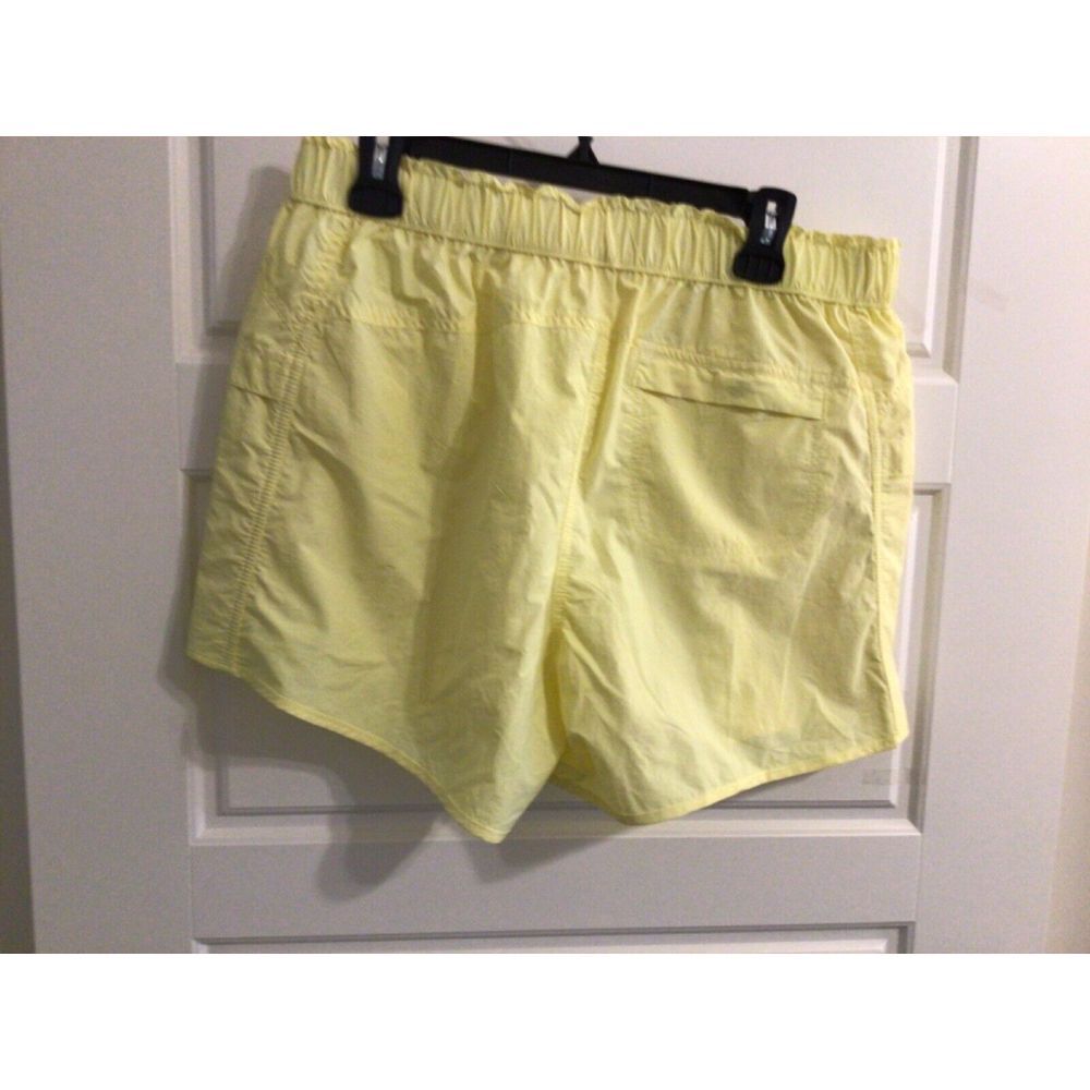 Free People FP movement in the wild shorts yellow size‎ Medium NWT Color: Glow - Picture 2 of 4